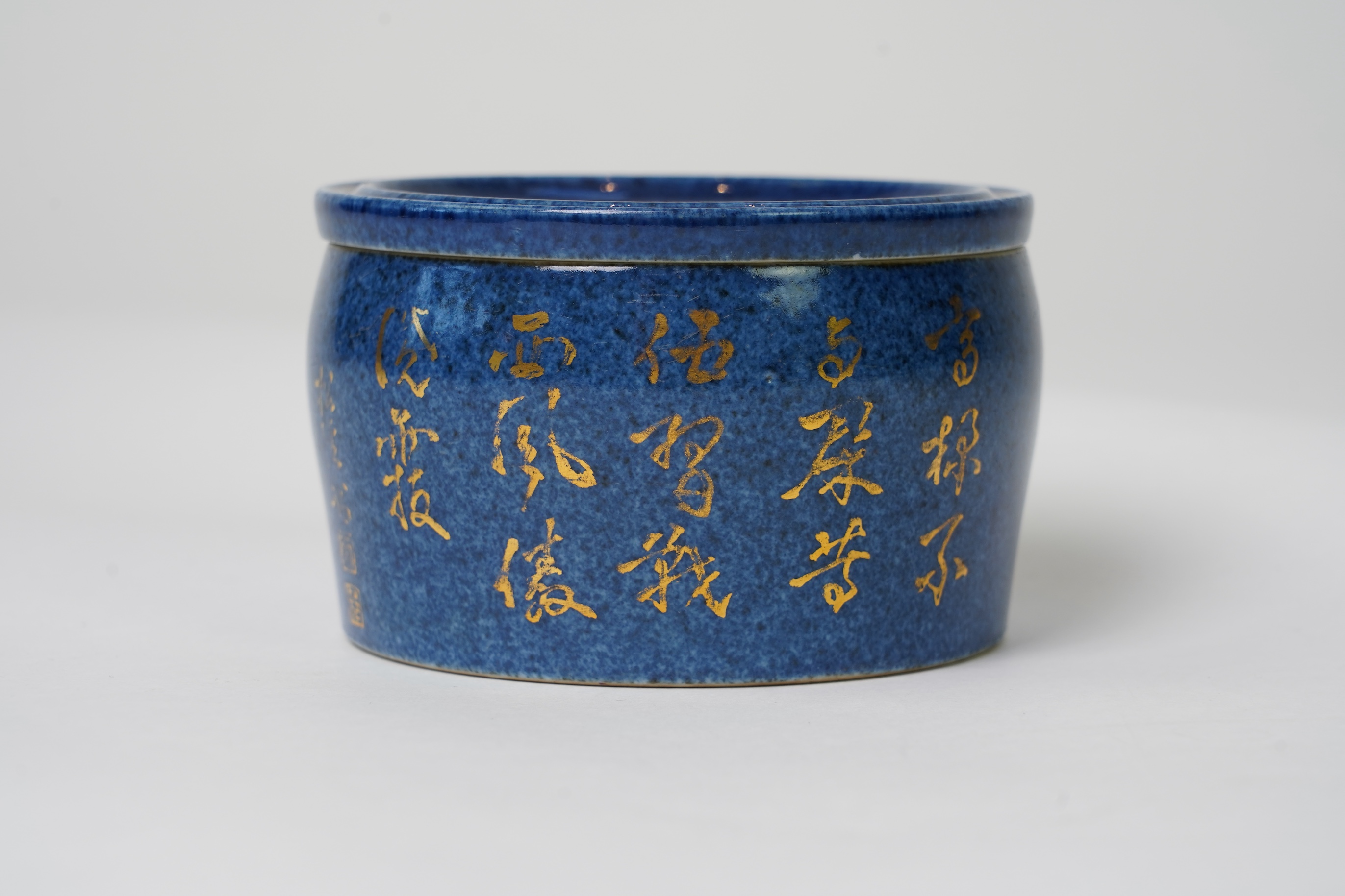 A Chinese gilt-decorated powder blue ‘fighting cricket’ box and cover, Xuande six character mark but later